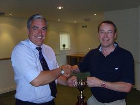 Peter Bennett presents the Steve Baker Trophy to Adrian Armitage